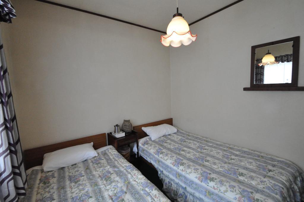 Guest House Wind Inn Hakuba Habitación foto